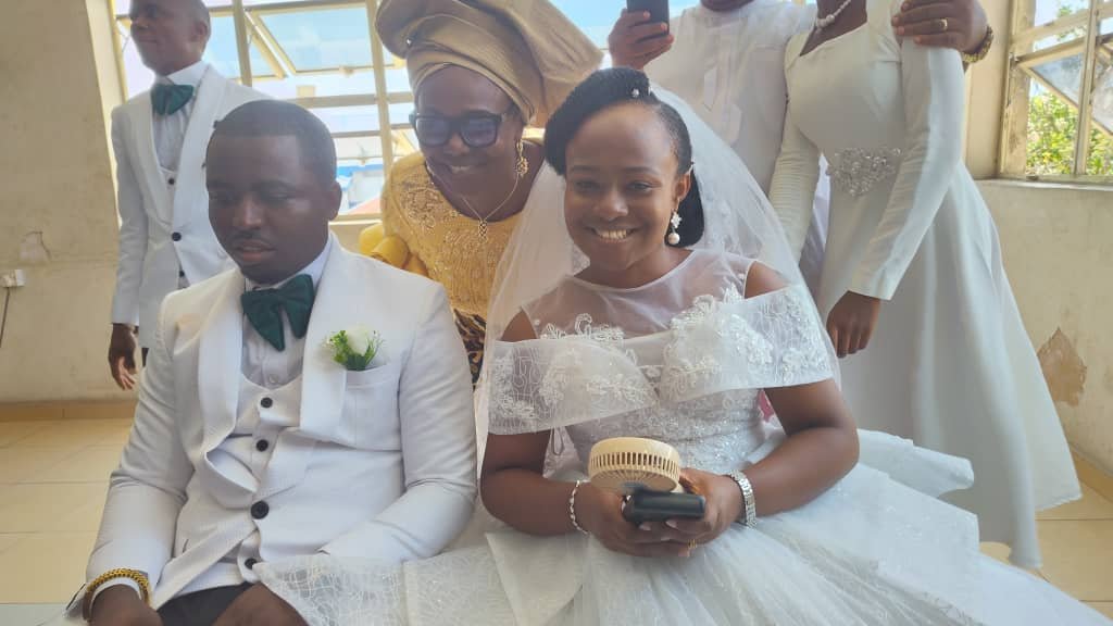 Dr. Mrs. Theresa Ettu (M); and the newlywed couple, Mr and Mrs. Emmanuel Onyemachi. 