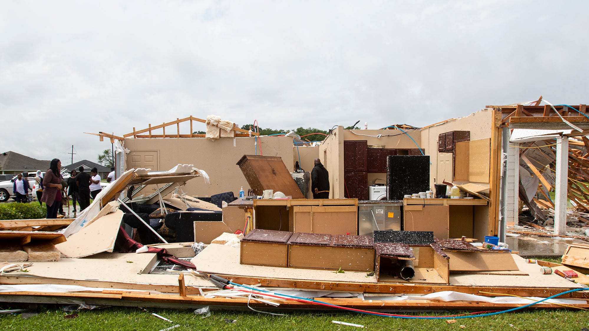 Brutal storms moving into the East after a harrowing night of tornadoes in the South leaves 18 dead