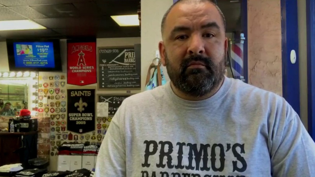 California barbershop owner defies lockdown, opens store