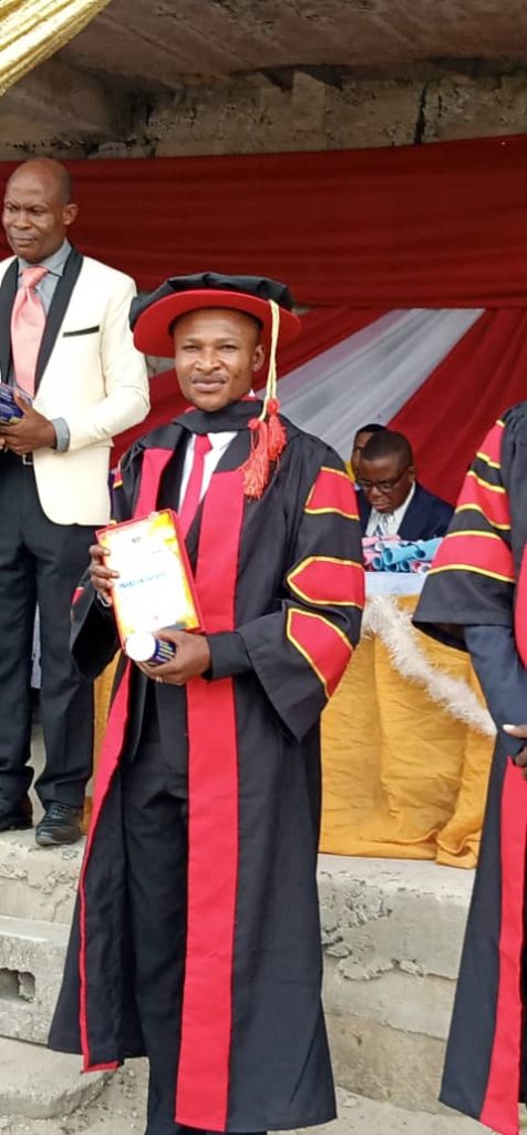 The Managing Director The Managing Director of ISUN Multipurpose Cooperative Society displaying his Doctorate Award at Evangel University. ISUN Multipurpose Cooperative Society displaying his Doctorate Award at Evangel University.