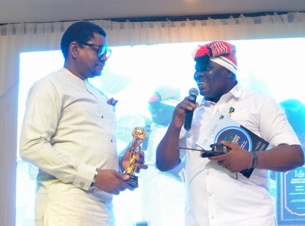 Mr. Ifeanyi Okali, receiving an award at Sheraton hotel, Abuja.