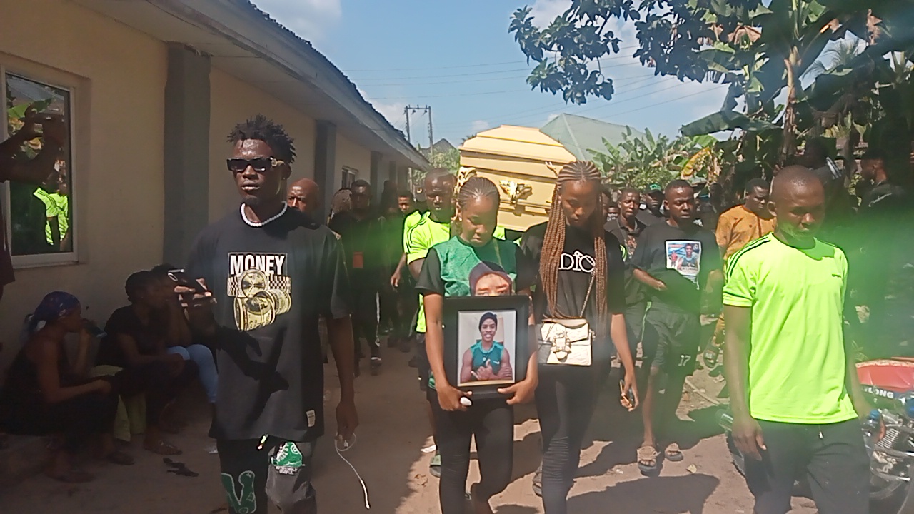 The remains of late Chibueze Cokey (aka. Onye Ball) being taken for interment.