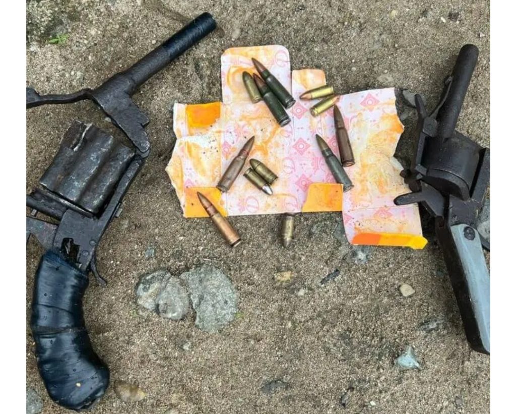 Guns and bullets recovered from suspected gunmen who killed two police officers on legitimate duty with the Commissioner for Commerce, Trade and Investment, Dr. Chimezie Ukaegbu.