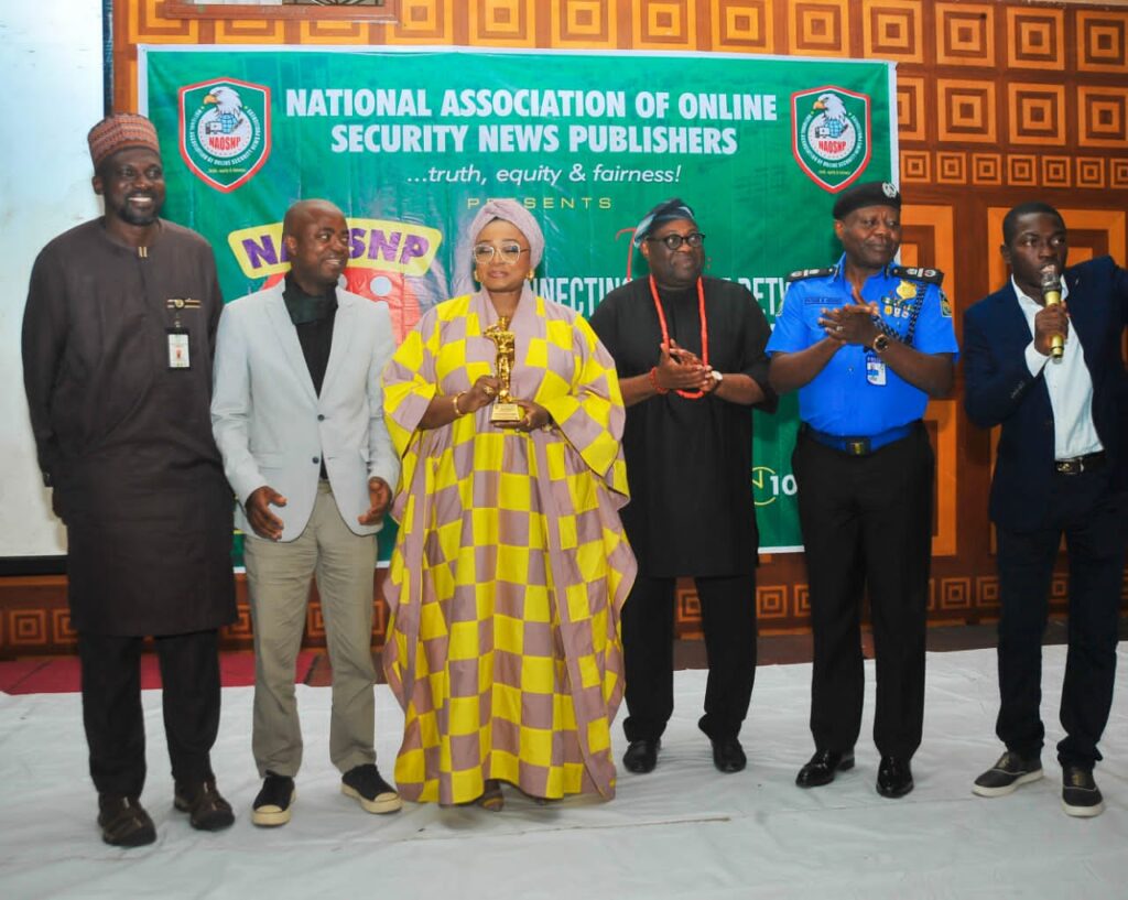 The Honourable Minister of State for Police Affairs, Hajia Imaan Sulaiman-Ibrahim, flanked by secure stakeholders at 2024 NAOSN award.