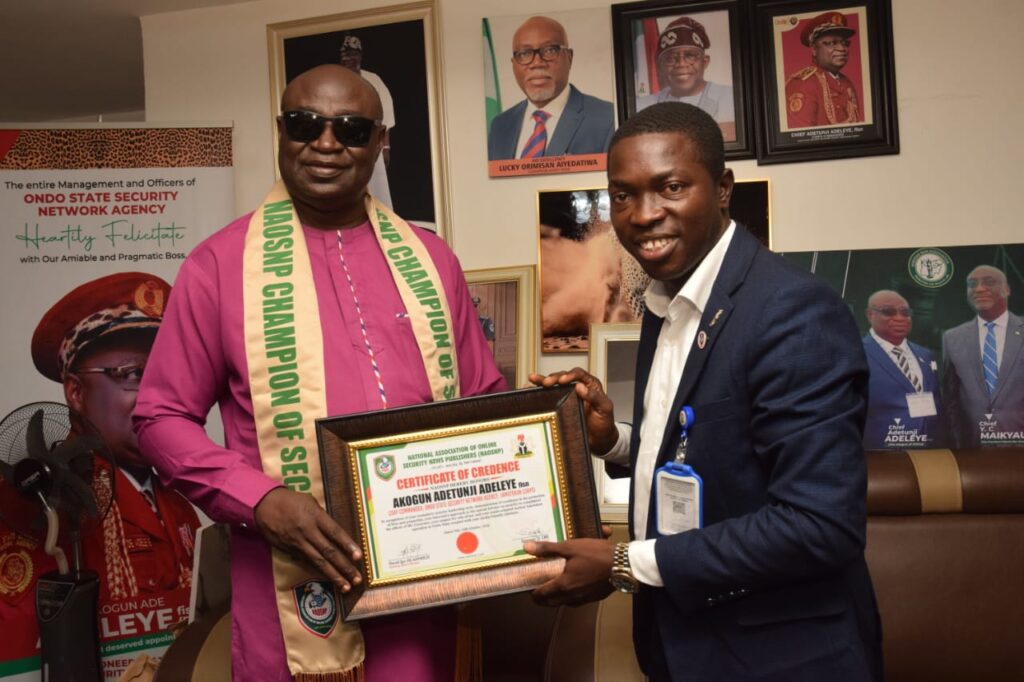 Akogun Adetunji, Ondo Amotekun boss and the national president of National Association of Online Security News Publishers, NAOSNP, Sampson Oki.