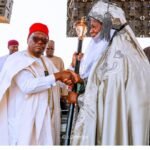 Governor Ahmadu Umaru Fintiri, the Executive Governor of Adamawa (L), presenting the staff of office to the Emir of Maiha Emirate, HRH Alhaji Ahmadu Saibaru Sanda.