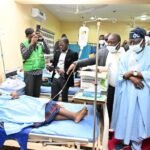 President Bola Ahmed Tinubu sympathising with one of the victims of Benue massacre.