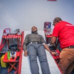 Access Bank staff donating free blood in commemoration of World Blood Donor Day and World Sickle Cell Day 2025.