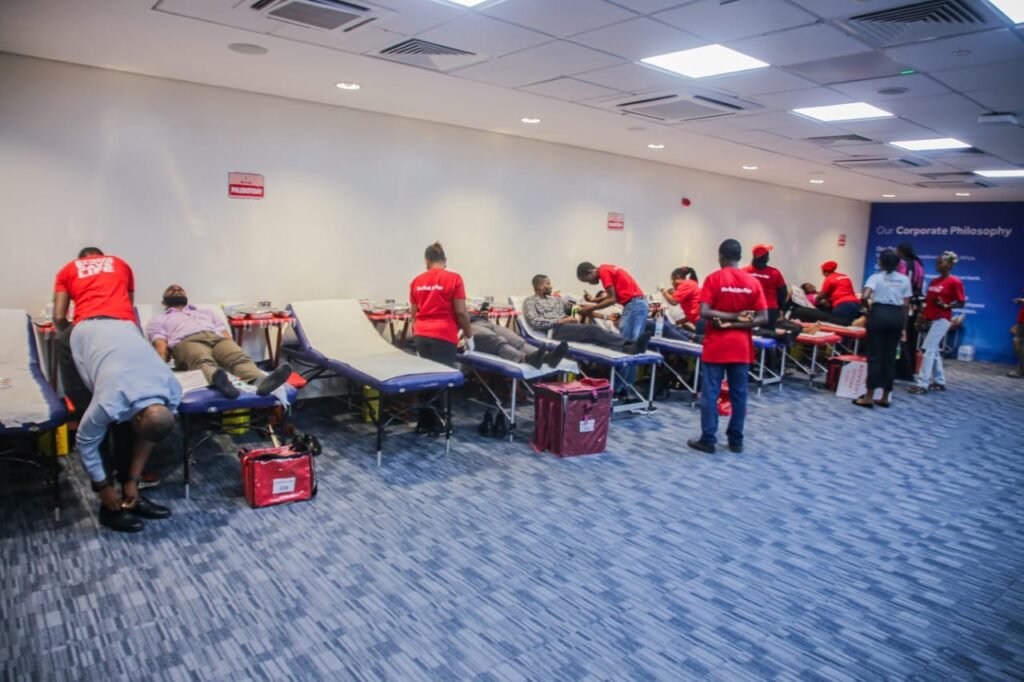 Access Bank staff donating free blood in commemoration of World Blood Donor Day and World Sickle Cell Day 2025.
