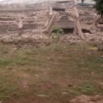 Breaking news: Tension, as High Chief Ikechi Emenike’s alleged 3-storey Building collapses, traps mother, child