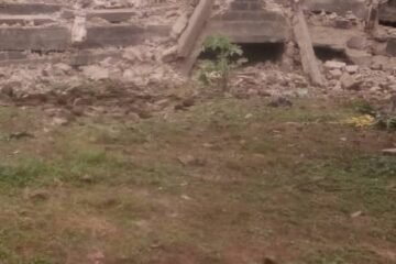 Breaking news: Tension, as High Chief Ikechi Emenike’s alleged 3-storey Building collapses, traps mother, child