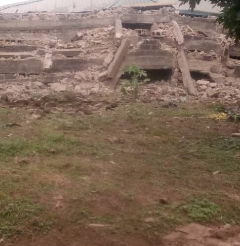 Breaking news: Tension, as High Chief Ikechi Emenike’s alleged 3-storey Building collapses, traps mother, child