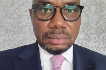 Innocent Ike as Access Holdings’ Substantive Group MD/CEO, commends Bolaji Agbede’s impacts