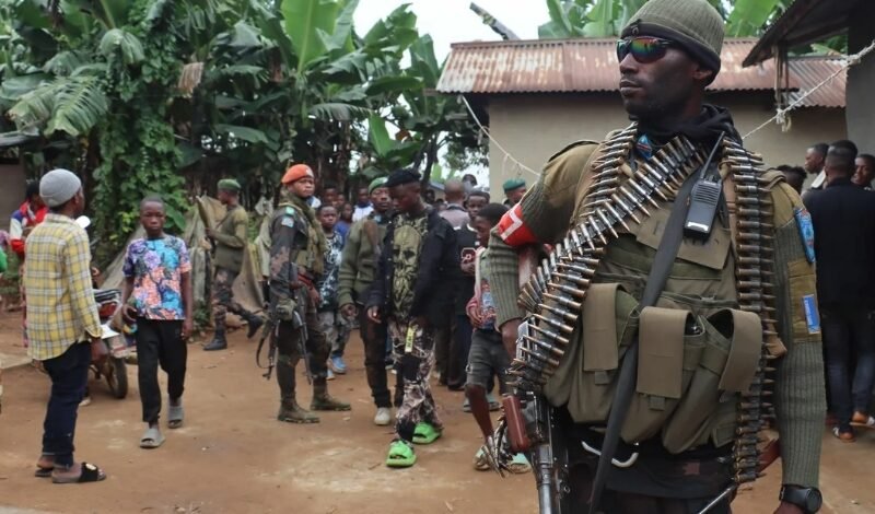 A cross-section of mourners and soldiers.