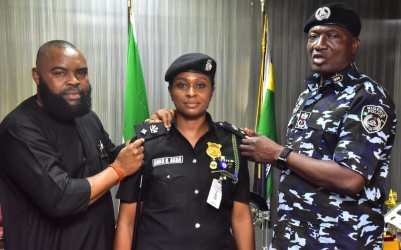 Lagos State Commissioner of Police, CP Olohundare Moshood Jimoh decorated a newly promoted officer.