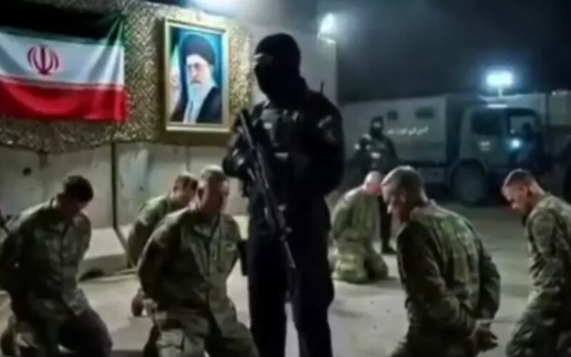 Captured US soldiers kneeling down in Iran