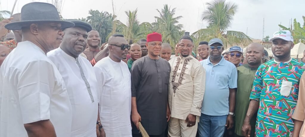 Hon. Chijioke Chukwu, the State chairman of the All Progressives Congress (APC) party, (4L) flanked by party members.
