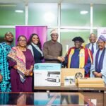 Photo caption: Chris Ofikulu, Executive Director, Retail & Commercial Banking, Polaris Bank, presents office equipment for takeoff and smooth operation of NACCIMA Export Support Centre in Lagos recently.