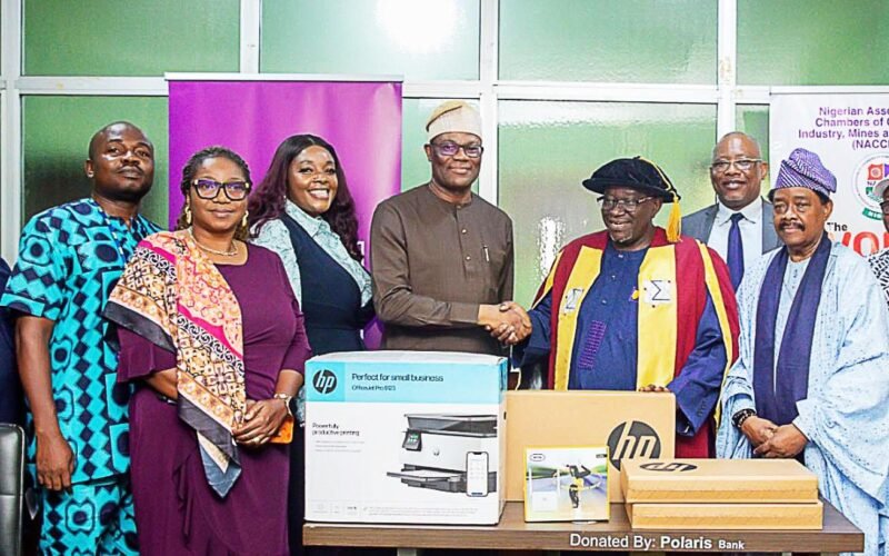 Photo caption: Chris Ofikulu, Executive Director, Retail & Commercial Banking, Polaris Bank, presents office equipment for takeoff and smooth operation of NACCIMA Export Support Centre in Lagos recently.