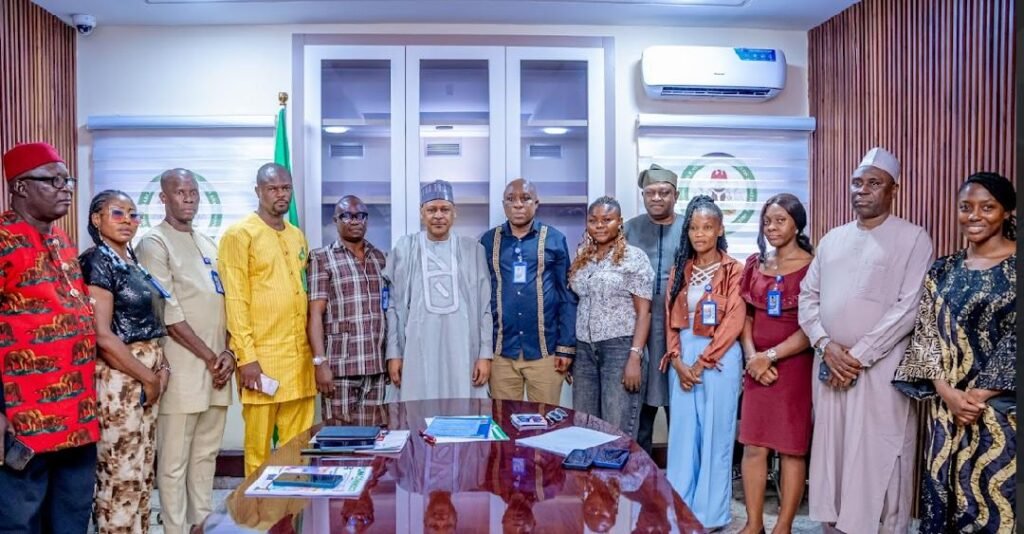 Hon. Minister of Information and National Orientation, His Excellency Idris Mohammed ((6L); Comrd. Akpovoke Otiti (5L), flanked by other members of Online Media Editors and Publishers GOMEP-NG and staff of the ministry.