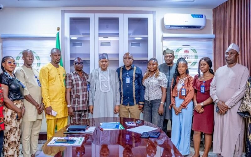Hon. Minister of Information and National Orientation, His Excellency Idris Mohammed ((6L); Comrd. Akpovoke Otiti (5L), flanked by other members of Online Media Editors and Publishers GOMEP-NG and staff of the ministry.