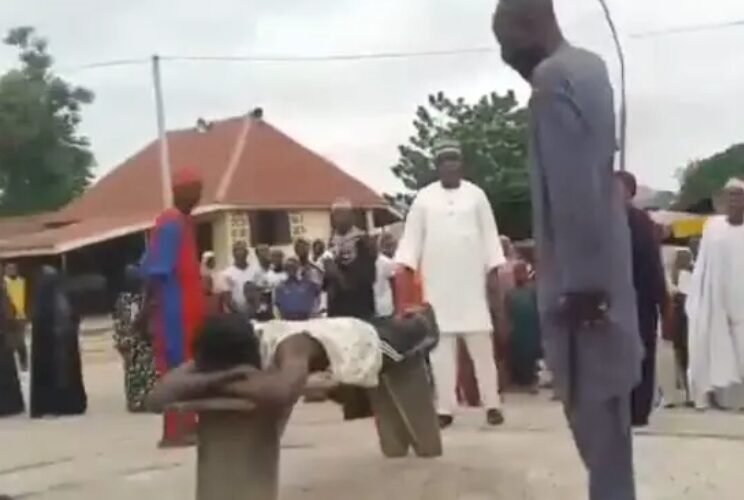 Aliyu Bala, the Northern man who was sentenced to 13-years imprisonment, receiving his 20 strokes of the cain for raping his neighbour's 10-years-old daughter.