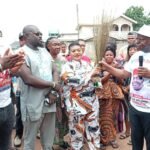 Lolo Oluchi Madumere receiving the symbols of the All Progressives Congress (APC) from chief Chidi Nwosu.
