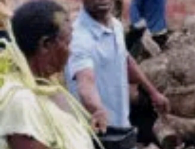 The Enugu Woman accused of witchcraft and one of the men who forced her to eat human faeces and drink pond water.